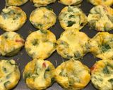 A picture of step 5 of Spinach, Tomato, and Cheese Omelette Muffins.
