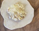 A picture of step 5 of Baked Padma Luchi.