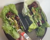 A picture of step 6 of Korean Black Bean Chicken Lettuce Wraps.