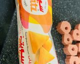 A picture of step 3 of Cheesy Ribbon sausages.