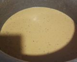 A picture of step 3 of Karhi pakora with curry leaves.