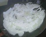 A picture of step 6 of Neerdose(waterydosa) with sweet coconut milk.