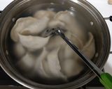 A picture of step 4 of Pork, Celery, and Corn Dumplings.