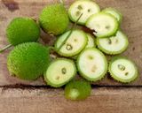 A picture of step 1 of Spiny Gourd / Kakrol Bhorta.
