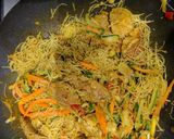 A picture of step 7 of Singapore style pork noodles.