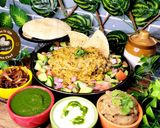 A picture of step 4 of Uttar Pradesh Urad Daal Aur Naye Chawal ki Khichdi Aloo Bharte Aur Hari Chutney (dinner or lunch).