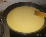 A picture of step 1 of Resturant style Punjabi kadhi pakora.
