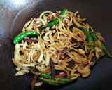 A picture of step 4 of Peyajkoli Dim (Egg cooked with Spring Onion).
