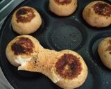 A picture of step 4 of Cheese Bombs in Pancakes Pan.