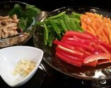 A picture of step 1 of Stir fry Peppers with Marinated Chicken Slices.