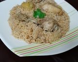 A picture of step 10 of Chicken white pulao.