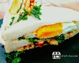รูปขั้นตอนการทำที่ 7 ของ แซนวิชกะเพราไก่ใบกะเพรากรอบกับไข่ดาว