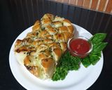 A picture of step 4 of Pull apart Herby Cheese Garlic Bread.