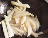 A picture of step 4 of #Tiffin box bhindi with French fries.
