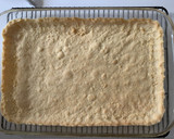 A picture of step 2 of Maple Pecan Shortbread Bars.