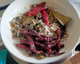 A picture of step 1 of Kanda-Lasoon Masala.