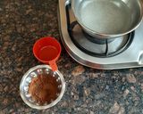 A picture of step 1 of Chocolate almonds dates.