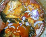 A picture of step 5 of White Rice with catfish pepper soup and cucumber.