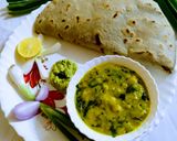 कांद्याची पात घालून हाटून पिठल (pithla recipe in marathi) रेसिपी स्टेप 8 फोटो 
