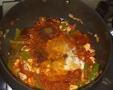 A picture of step 14 of Reshmi paneer curry.