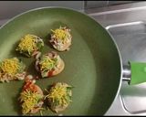 A picture of step 3 of Papdi pizza with salsa topping.