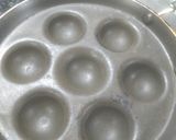 A picture of step 3 of Lobia Dahivada in Appe pan.