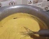 A picture of step 3 of Karhi pakora with curry leaves.