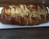 A picture of step 5 of Pull apart garlic cheesy bread.