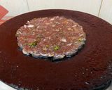 A picture of step 5 of Ragi rotti with drumstick leaves.