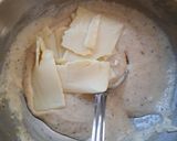 A picture of step 7 of Penne Pasta in cheesy oats white sauce.