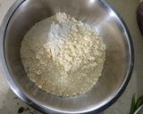 A picture of step 2 of Onion Jowar Atta Pakoda.