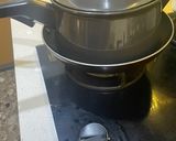 A picture of step 8 of Tomato rice in pan.