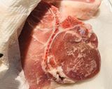 A picture of step 1 of Smothered Pork Chops.