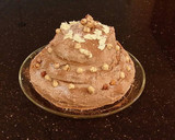 A picture of step 18 of Hazelnut Layer Cake with Hazelnut Cream Frosting.