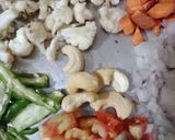 A picture of step 1 of Veggie daliya upma.
