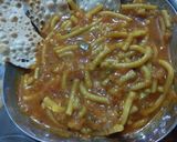 A picture of step 7 of Leave Sev Tomato Curry.