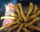A picture of step 2 of Kurkure cheese open sandwich.