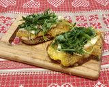 A picture of step 9 of Bruschetta with Caramelized Figs, Toma Cheese, and Arugula.
