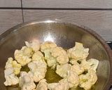 A picture of step 3 of Moong Dal with peas and cauliflower.