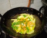 A picture of step 2 of Jeera aloo matar fry without onion garlic.