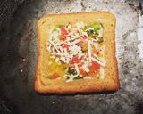 A picture of step 4 of Egg in a bread hole.