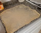 Foto del paso 3 de la receta: Ensaimada rellena de crema pastelera y azúcar quemada