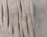 A picture of step 4 of Lacha paratha.