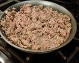 A picture of step 3 of Cheeseburger Egg rolls.