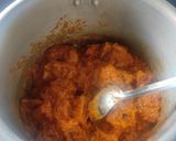 A picture of step 2 of Chicken Biryani in cooker.