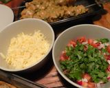 A picture of step 2 of Chicken satay kebabs and home made pili pili cheesy chapati nachos in the jiko oven :).