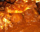A picture of step 4 of Crab malai curry.