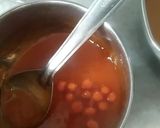 A picture of step 7 of Mango Boba Drink (with homemade mango bubbles).