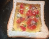 A picture of step 5 of Cheesy Egg Toast.