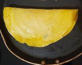 A picture of step 9 of Stuffed vegetable chilla.